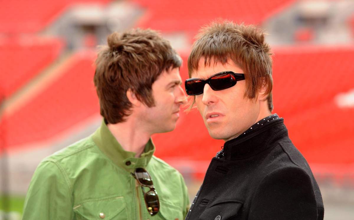 Oasis band members and brothers Noel Gallagher and Liam Gallagher shown here in 2008 before a show at Wembley Stadium. Alan Cross assesses the odds of an eventual band reunion. 