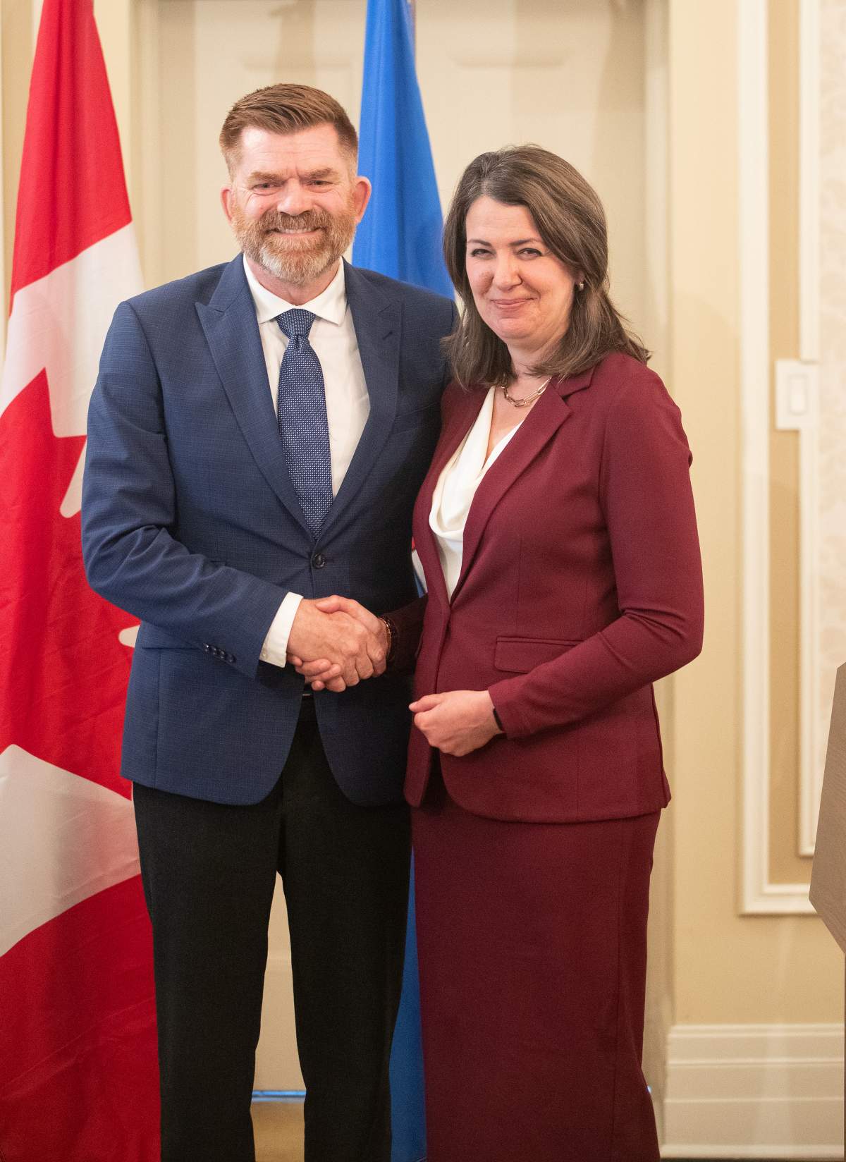 Alberta Premier Danielle Smith and Minister of Energy and Minerals Brian Jean stand together during the swearing in of her cabinet, in Edmonton, Friday, June 9, 2023.