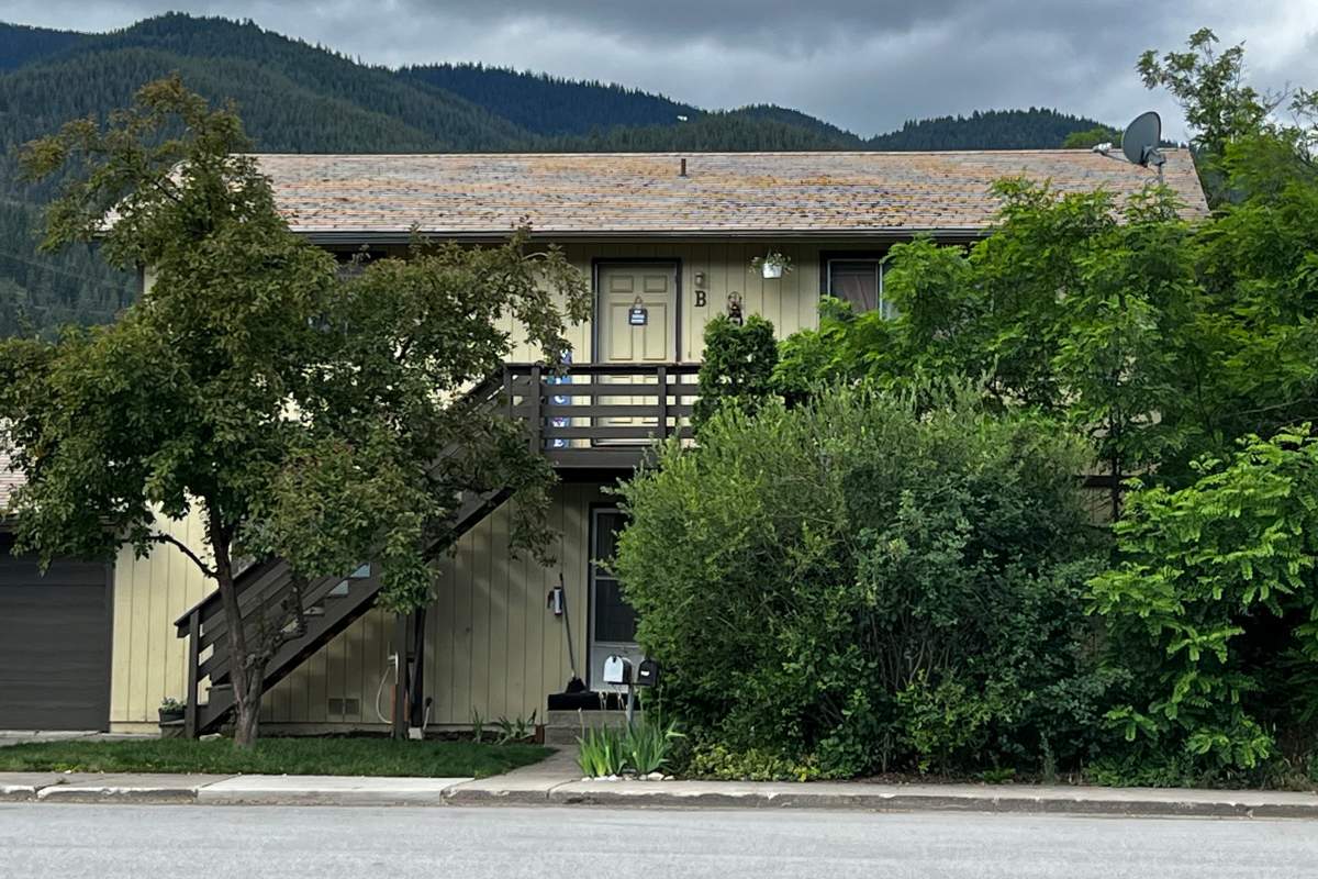 A 31-year-old man who lived in the upstairs unit of this duplex in Kellogg, Idaho, has been charged with four counts of murder after prosecutors said he shot and killed the family that lived in the downstairs unit, including one child, on June 18.