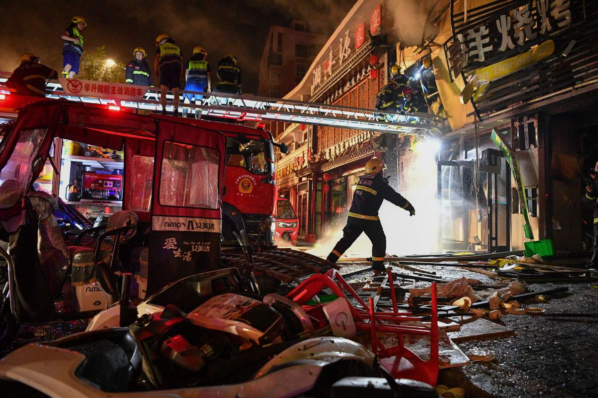 In this photo released by Xinhua News Agency, firefighters work at the site of an explosion at a restaurant in Yinchuan, northwest China’s Ningxia Hui Autonomous Region, Wednesday, June 21, 2023. China’s president Xi Jinping ordered a national safety campaign on Thursday after a massive cooking gas explosion at a barbecue restaurant in the northwest killed 31 people and injured seven others on the eve of a long holiday weekend. (Wang Peng/Xinhua via AP)