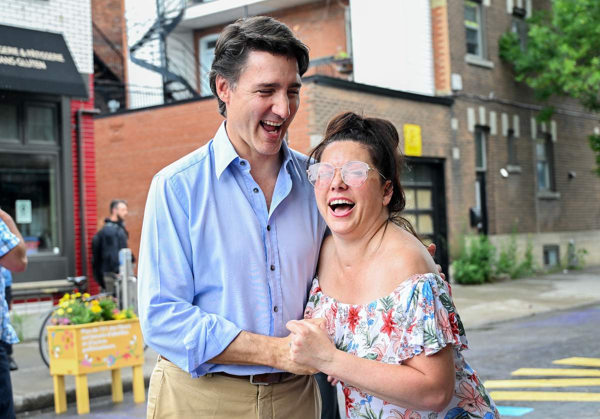 Prime Minister Justin Trudeau greets a woman during an event on Saint-Jean-Baptiste in Montreal, Saturday, June 24, 2023.