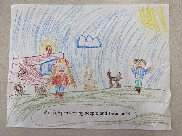 "P is for protecting people and their pets." read another student.