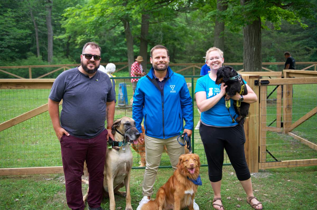 MPP David Piccini, middle, at the opening of the off-leash dog park.