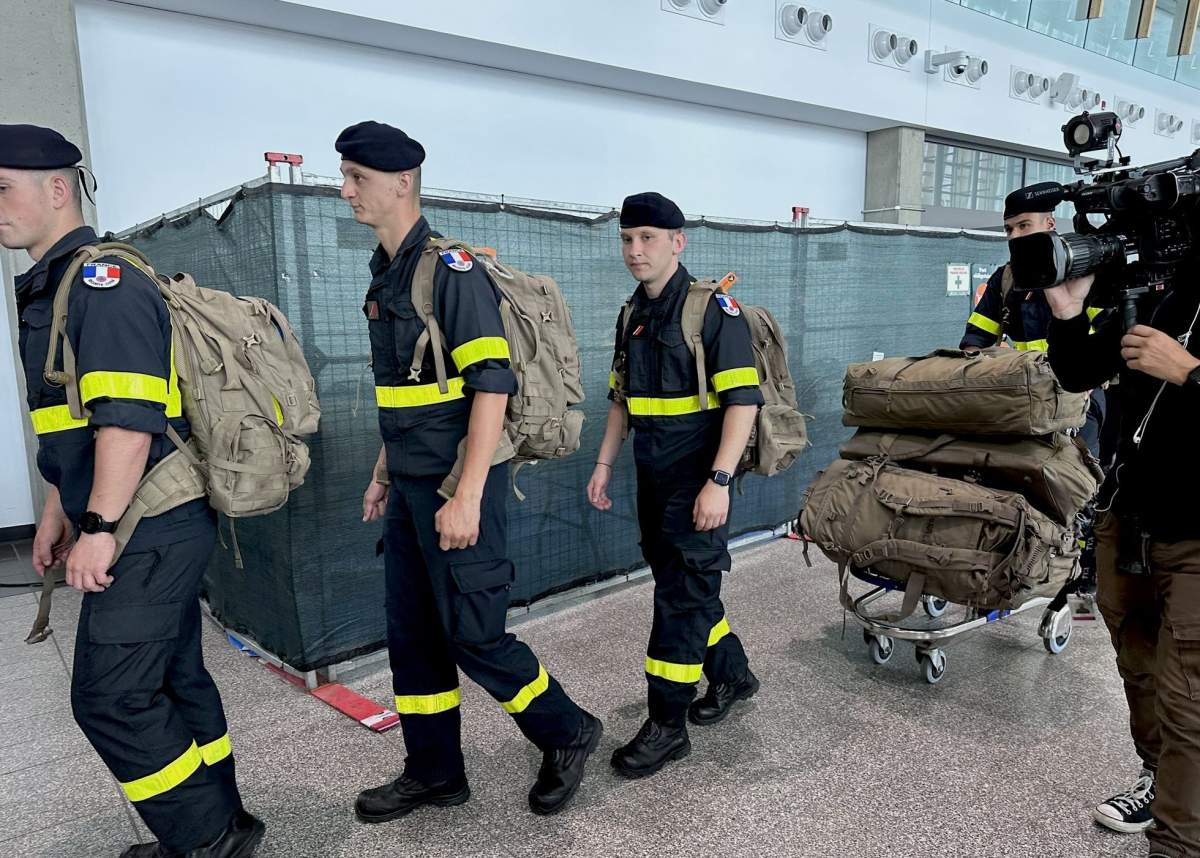 Firefighters from France are pictured arriving in Quebec to help the province battle the worst wildfire season on record. June 9, 2023.