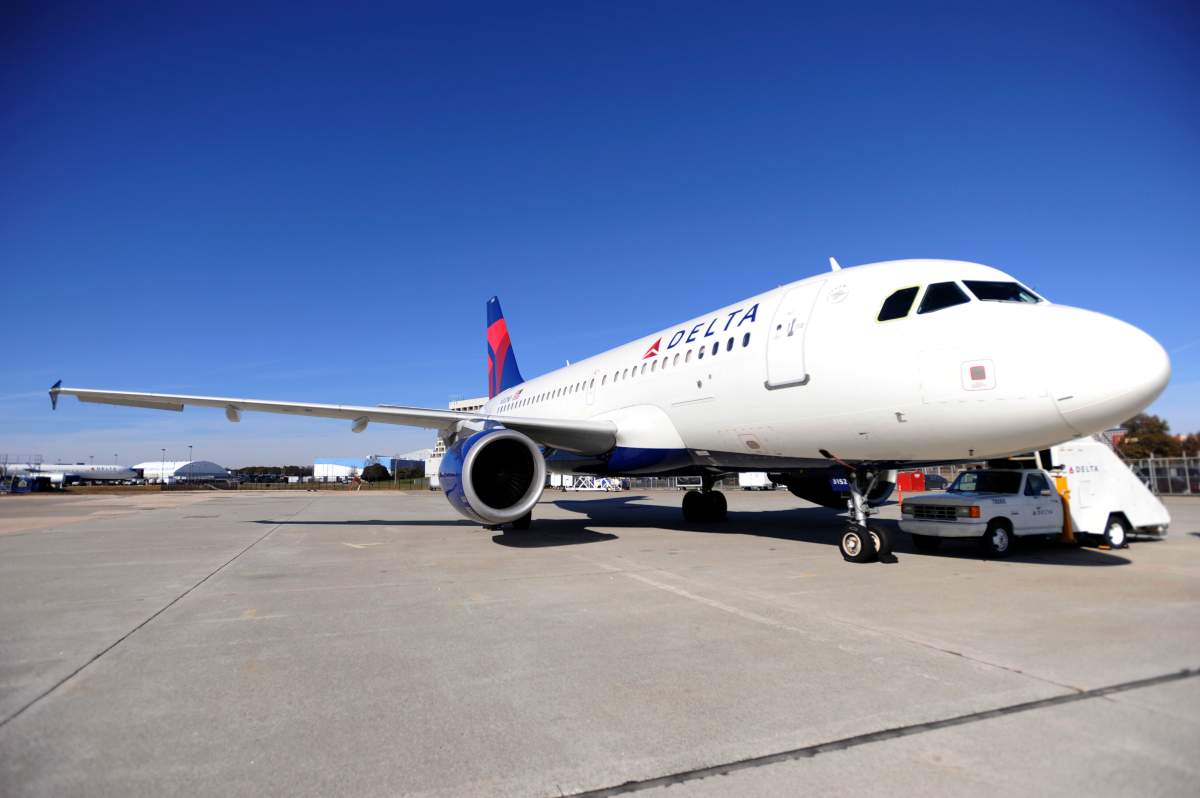 File - A Delta Air Lines Airbus A319 sits on the tarmac at the Hartsfield-Jackson Atlanta International Airport in Atlanta, Georgia, U.S., on Friday, Dec. 17, 2010.