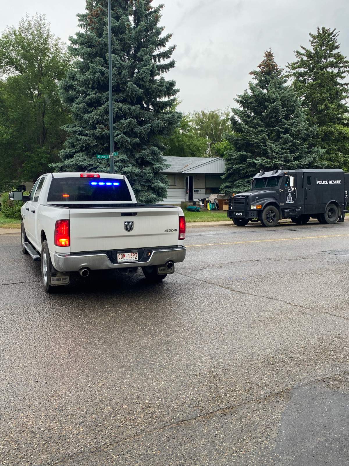 A photo of the high risk investigation taking place in the 1700 block and 16 ave. in Lethbridge on Friday June 9.