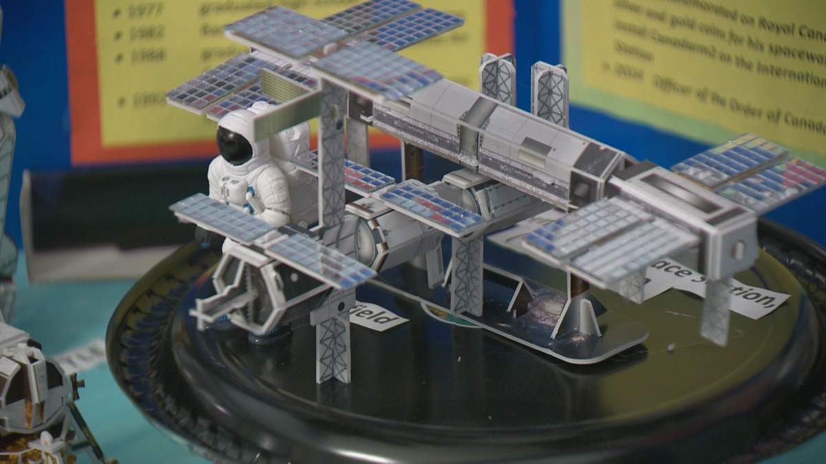 A close up of Ben Jebelli, and his project on Chris Hadfield.