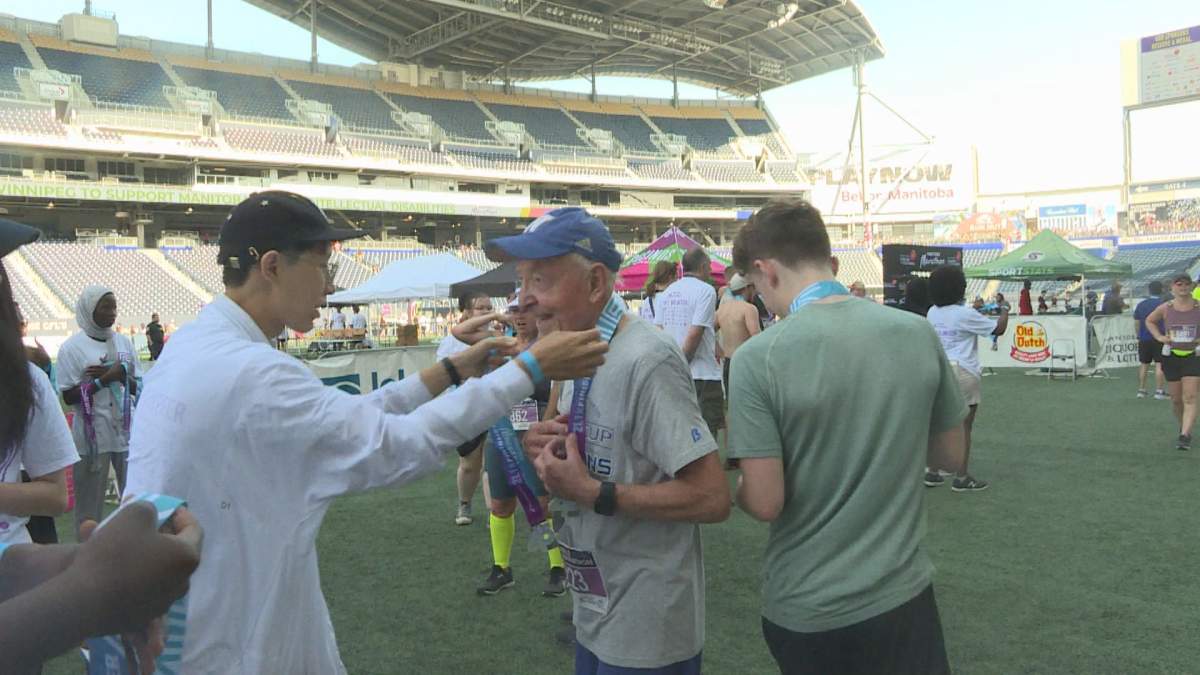 Gary Bochniski receiving his medal