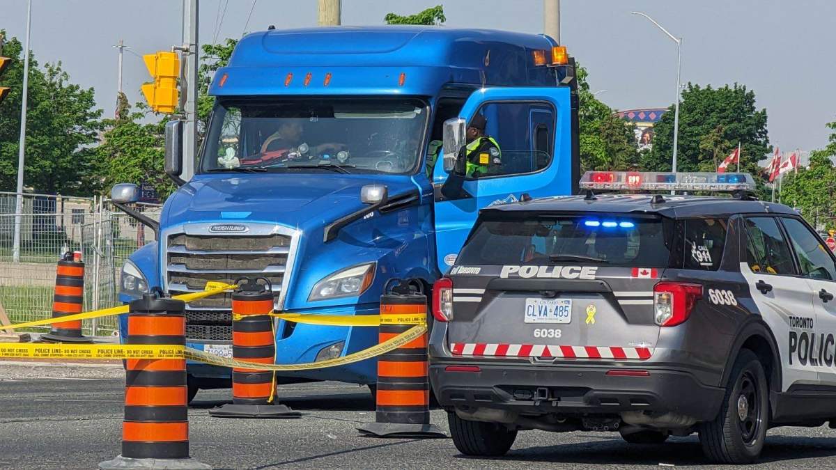 Police at the scene following a pedestrian collision involving a truck in Etobicoke on June 1,2023.
