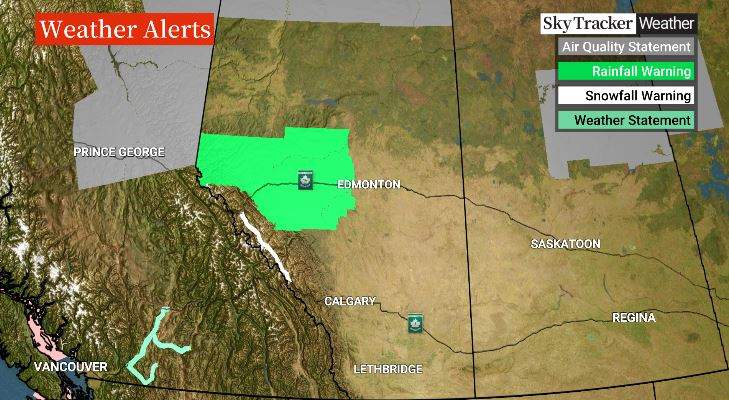 Environment Canada issued heavy rainfall warnings for most of the area on Sunday, including Edmonton and Edson, where a wildfire is burning just 1.5 kilometres away from the town.