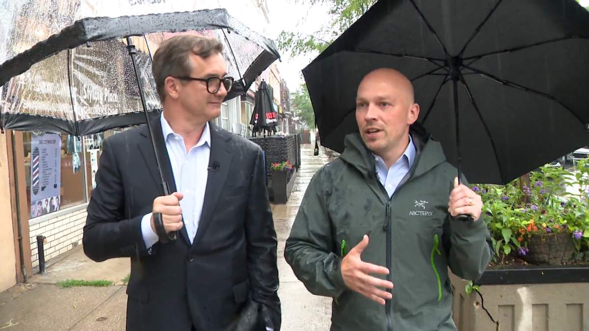 Brad Bradford walks with Global News’ Alan Carter.