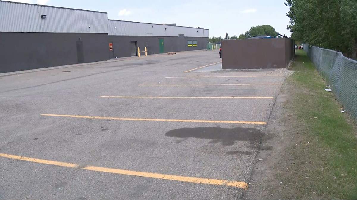 A body was found in an R.V. parked behind a bank in the Glenmore Square shopping centre in Ogden on June 26.