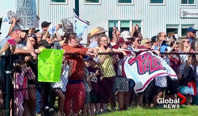 Fans greet the Peterborough Petes at the Peterborough Airport on June 3, 2023.