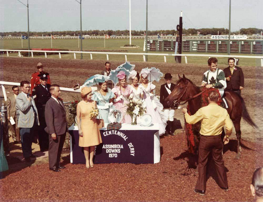 Queen Elizabeth presents the trophy for the 1970 Manitoba Derby, won by Ron Turcotte aboard Fanfreluche.