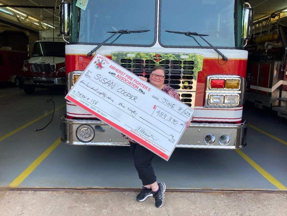 Susan Cooper, who had to evacuate her home with her family to escape the Tantallon wildfire, is the latest winner of the Nova Scotia Firefighters 50-50 draw.