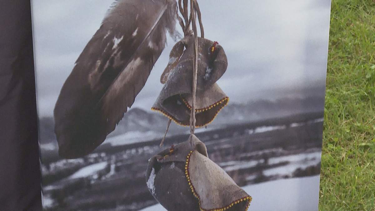 Photo of moccasins and eagle feather by Indigenous View