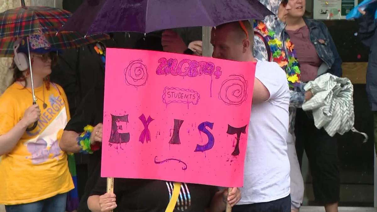 Protesters brough signs and posters to the rally Thursday afternoon.