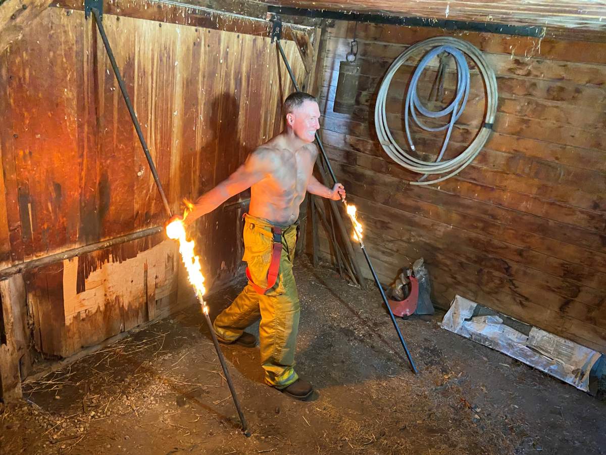 Calgary firefighter posing for the calendar.