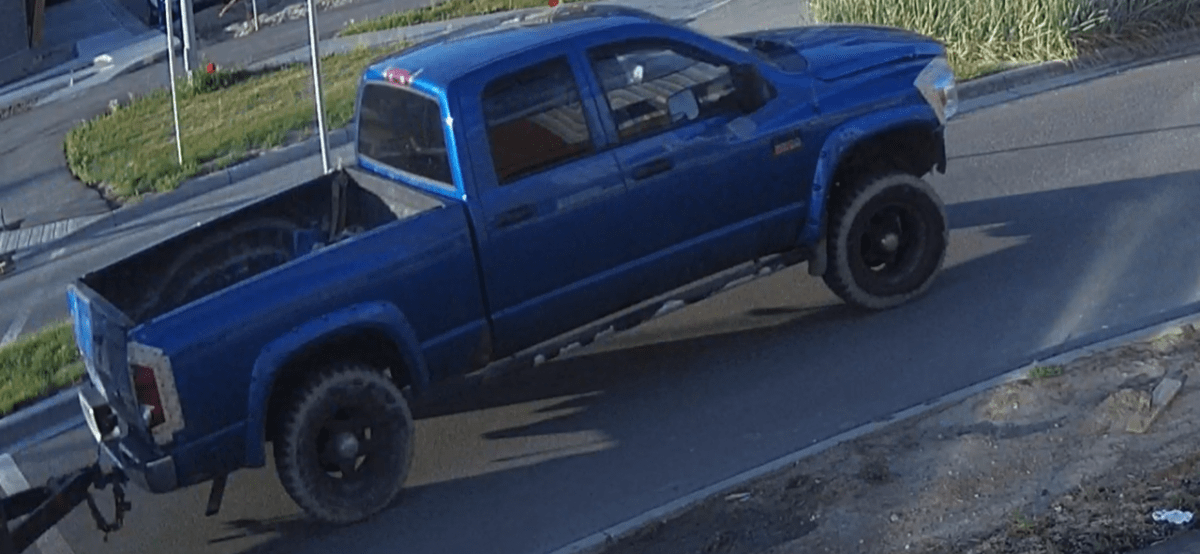A CCTV image of a blue pickup truck Calgary police believe was involved in a hit-and-run on June 23, 2023.