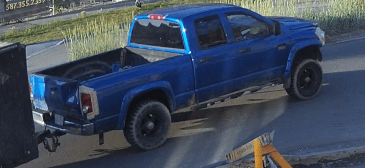 A CCTV image of a blue pickup truck Calgary police believe was involved in a hit-and-run on June 23, 2023.