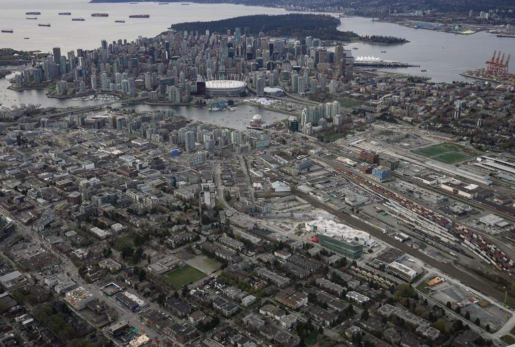 The downtown Vancouver skyline is seen in an aerial view from east Vancouver, on Saturday, April 9, 2022. 
