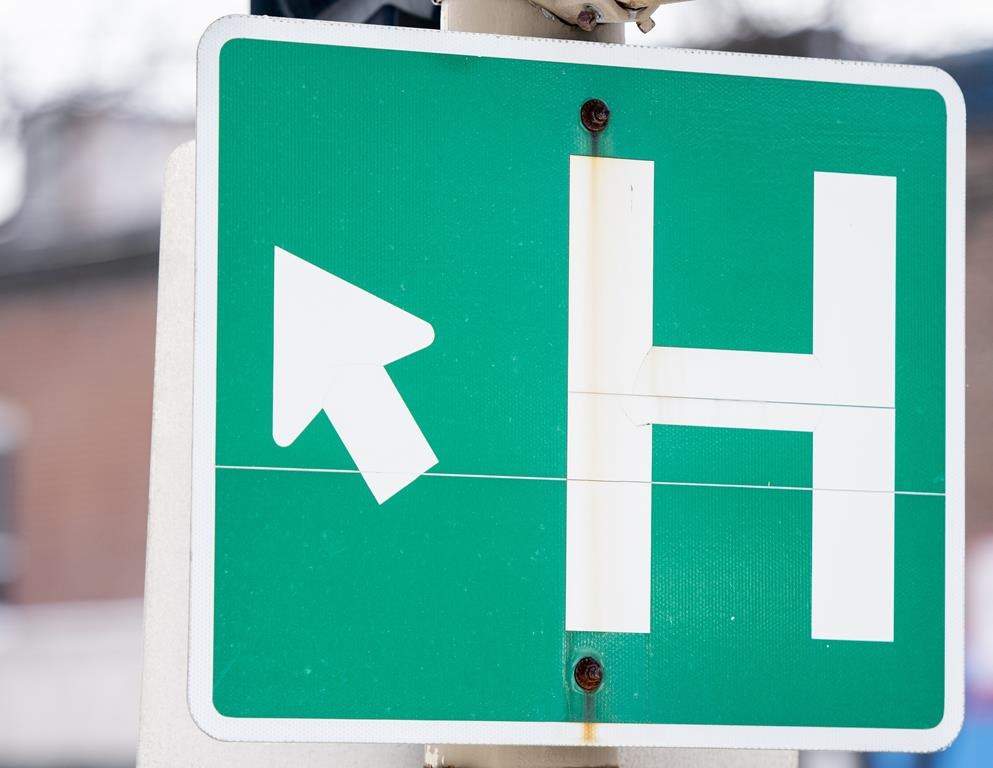 Island Health says a lack of staff has forced it to begin overnight closures of the emergency room at a small Victoria-area hospital. A sign for a hospital is shown in Montreal, Sunday, Feb. 6, 2022.