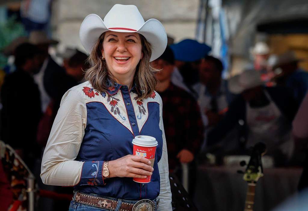 Alberta Premier Danielle Smith attends her Stampede pancake breakfast in Calgary, Alta., Monday, July 10, 2023. 
