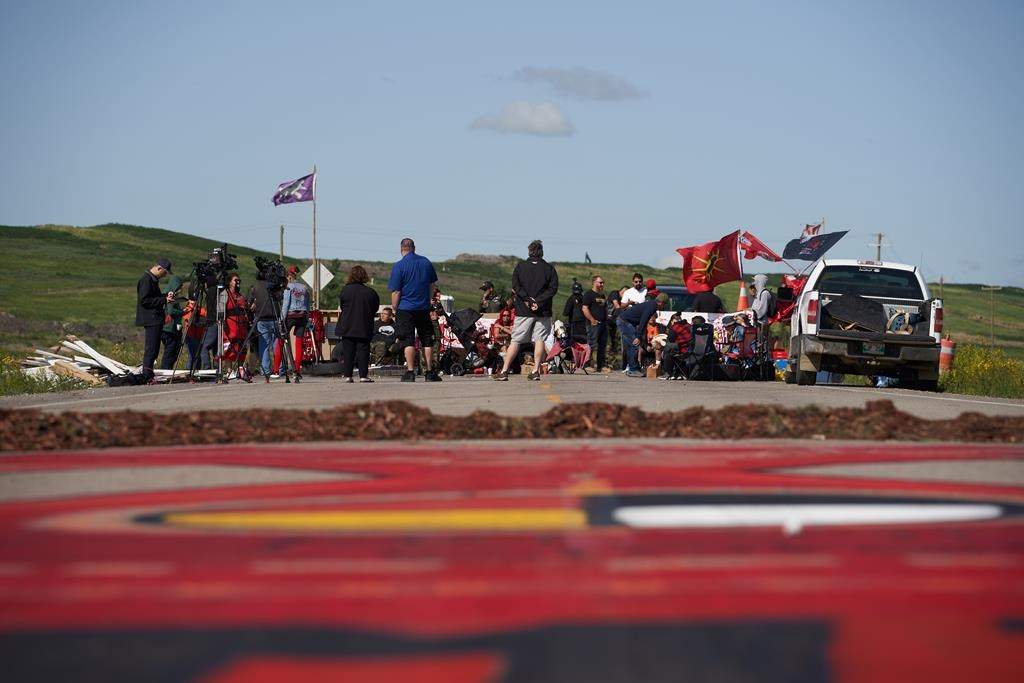 Activists for Indigenous rights blockade the main road into the Brady Road landfill, just outside of Winnipeg, Monday, July 10, 2023. The City of Winnipeg has applied for a court injunction to force an end to the blockade that has been in place since last Thursday.
