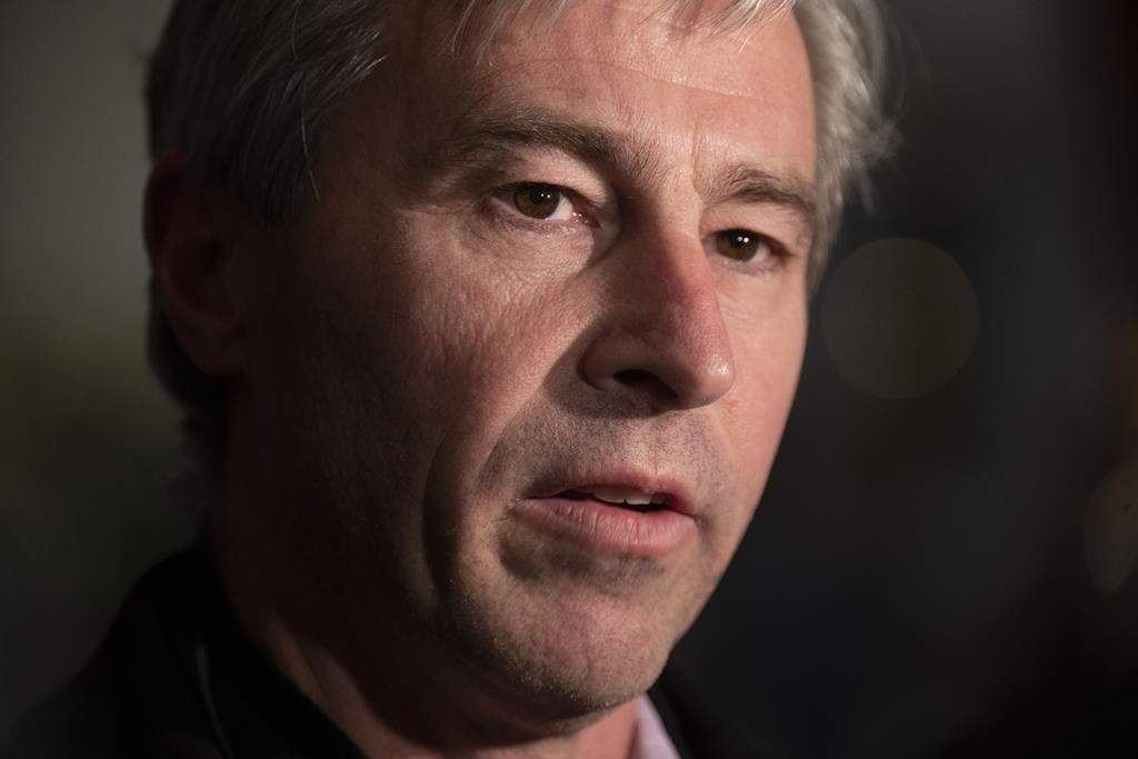 The Nova Scotia government is doubling down on its claim that it dismissed a judge leading a high-profile inquiry partly because the families involved had grown impatient with the process. Premier Tim Houston said his government had provided a number of extensions to provincial court Judge Warren Zimmer to allow him to finish his final report. Houston speaks with media, Monday, February 6, 2023 in Ottawa. THE CANADIAN PRESS/Adrian Wyld