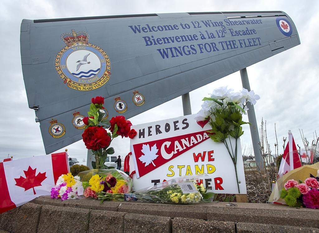 A memorial pays respect to the victims of a military helicopter crash, at 12 Wing Shearwater in Dartmouth, N.S., home of 423 Maritime Helicopter Squadron, on Friday, May 1, 2020. The families of six members of the Canadian Armed Forces who were killed in a "terrifying" helicopter crash in April 2020 are suing the manufacturer.THE CANADIAN PRESS/Andrew Vaughan