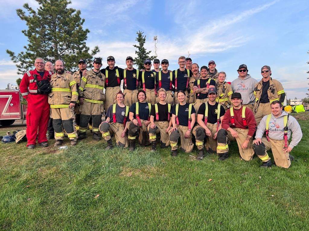 Lakeland College firefighter training students and staff pose in this undated handout photo.