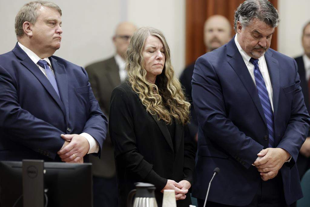 FILE - Lori Vallow Daybell stands and listens as the jury's verdict is read at the Ada County Courthouse in Boise, Idaho on Friday, May 12, 2023.