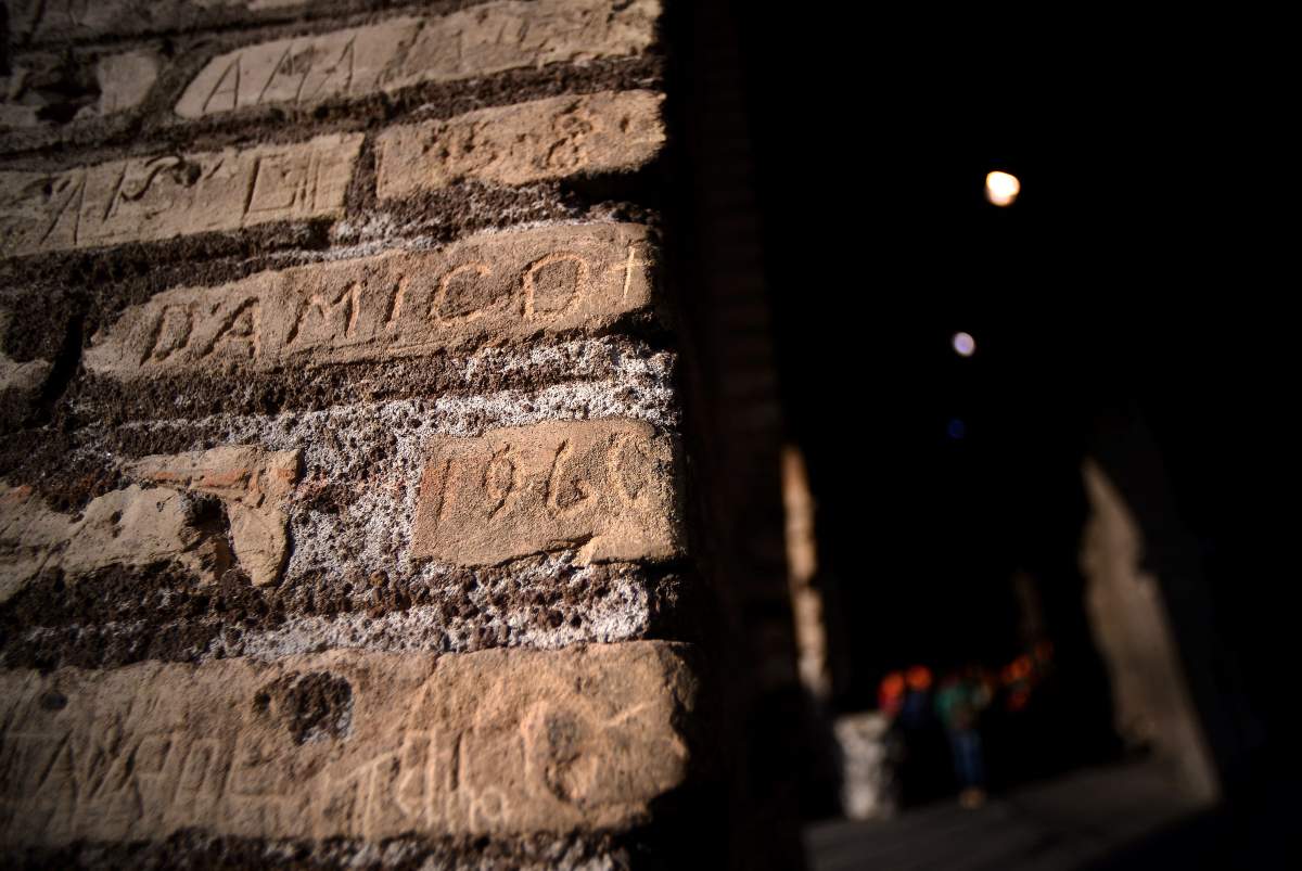 Names carved into bricks.