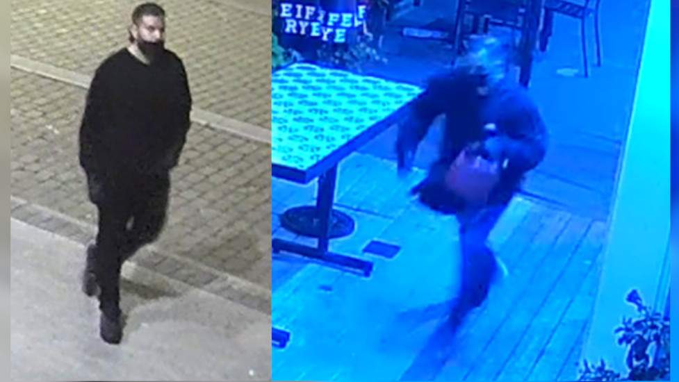 Photo of two arson suspects dressed in dark clothing seen on surveillance video near Hess Street in Hamilton.