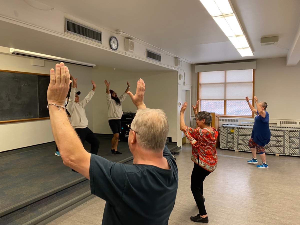 Seniors practice their Bhangra dancing moves at the Kerby Centre in downtown Calgary.
