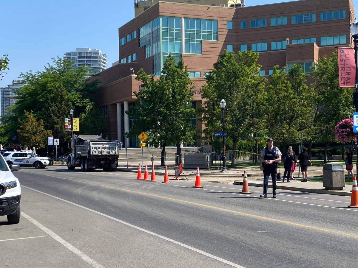 Police tape surrounds the courthouse in Kelowna, B.C., on Wednesday, July 5, 2023.