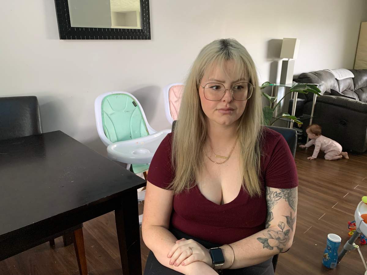 Kayleigh Fleet in her home.