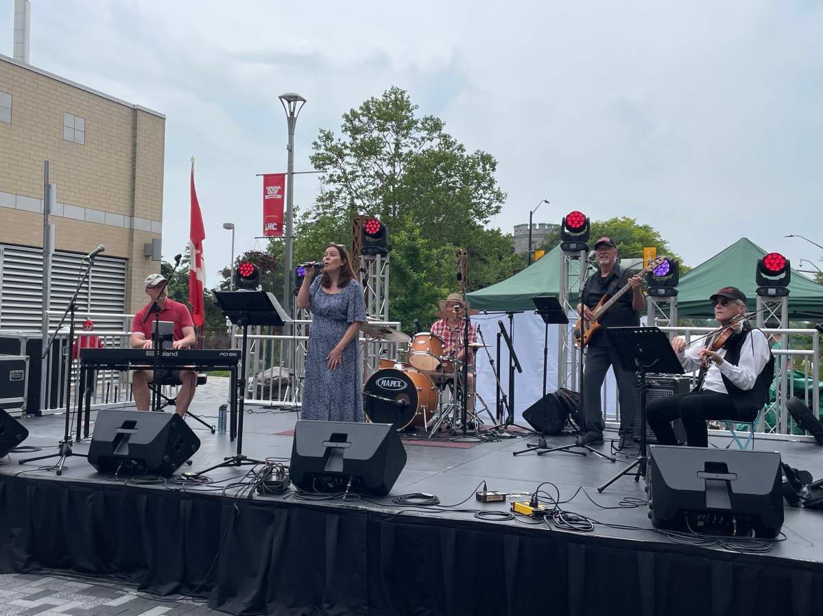 Enchante performs at Dundas Place on Canada Day. Lead singer Laurraine Sigouin also opened the day’s events with the singing of O Canada.