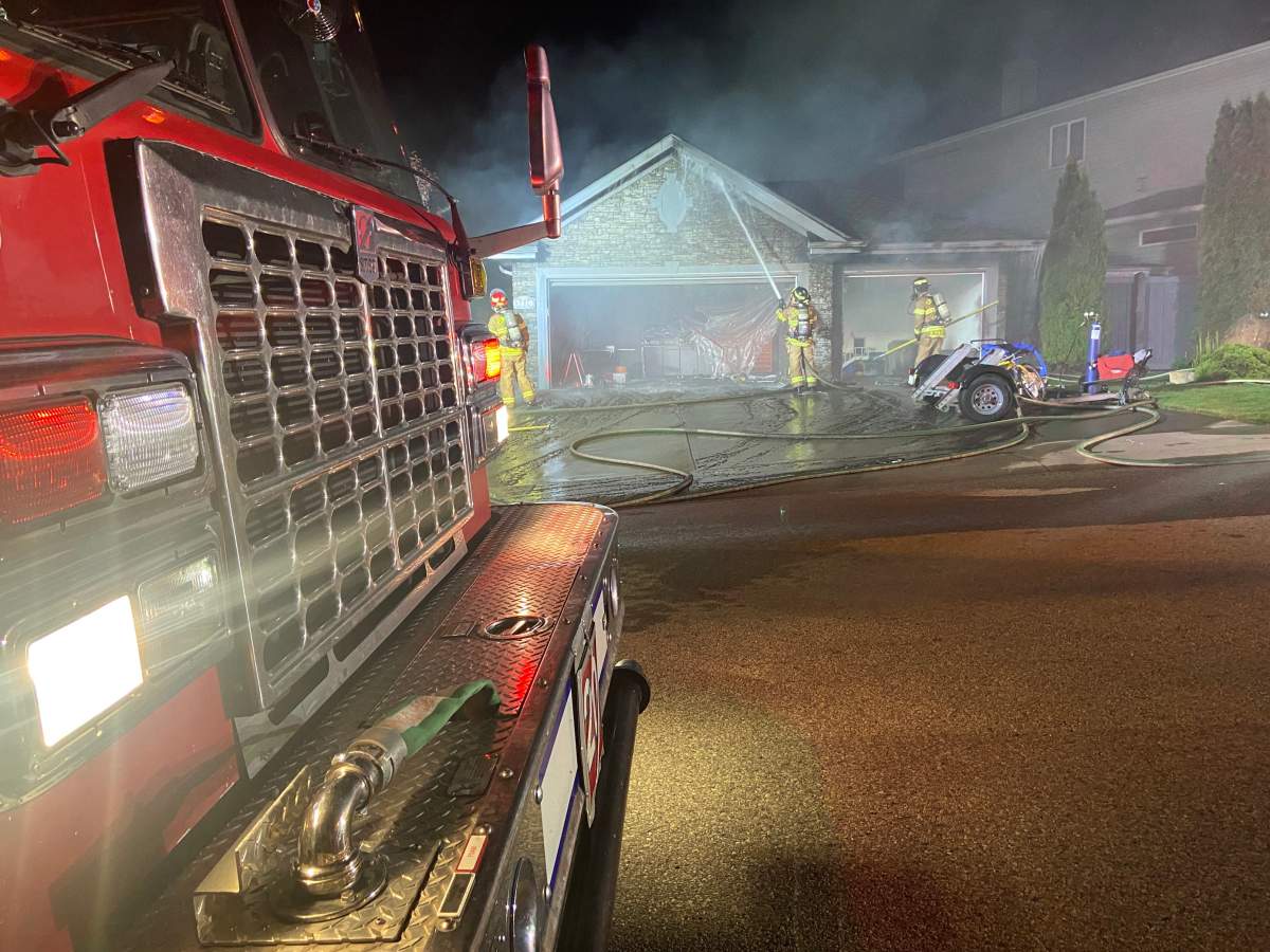 Photo of the home that was on fire in the McGrath Heights neighbourhood on July 11, 2023.