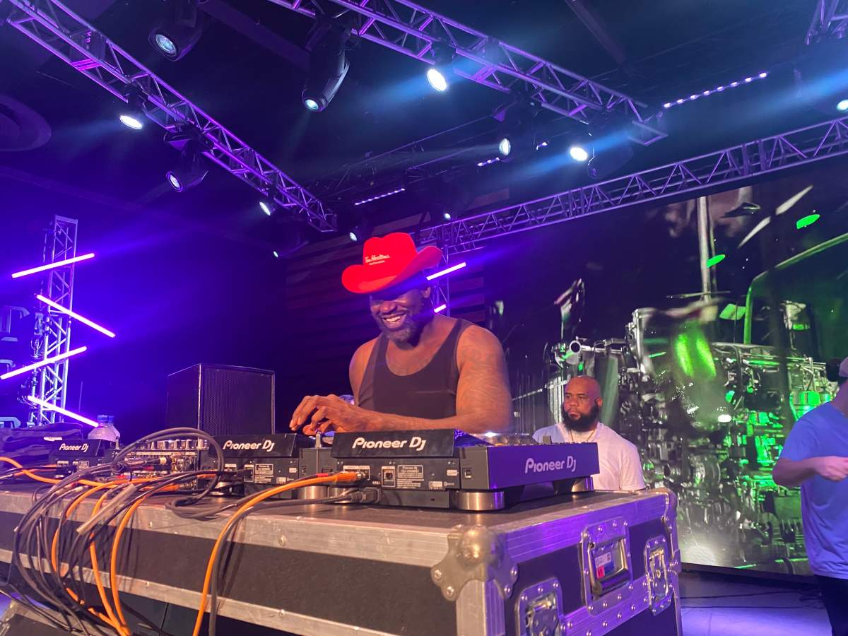 DJ Diesel smiling during his set at the Calgary Stampede
