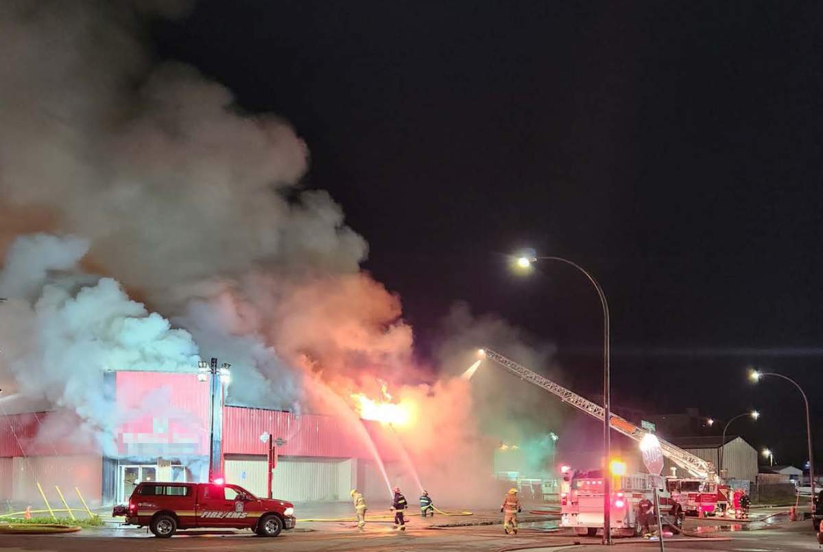 Firefighters tackle a blaze at a Thompson, Man., business.