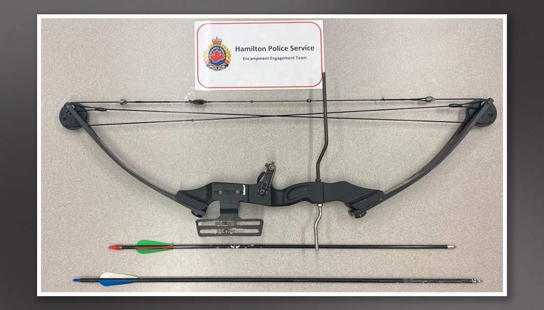 Police say officers on a foot patrol located an illegal archery compound bow and two arrows July 14, 2023 at Woodlands Park in Hamilton.