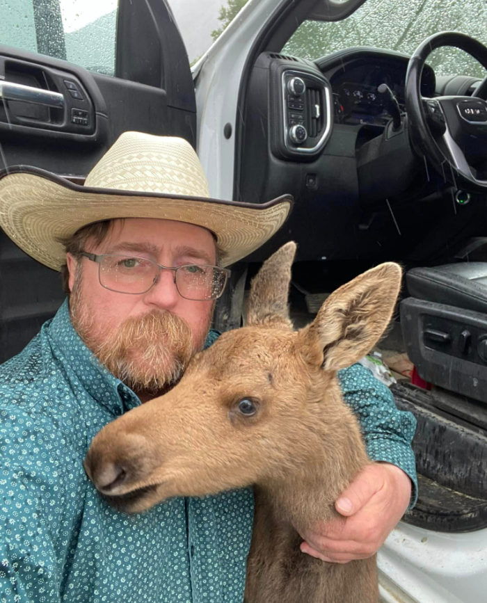 Fort Nelson's Mark Skage said he rescued an abandoned moose calf on or around June 6, 2023, bringing her back to Fort Nelson in his work truck. He has now lost his job, he told Global News on Sat. July 15, 2023.