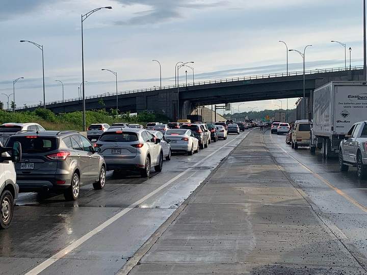 Traffic at standstill near the St-Pierre interchange due to flooding on the highway. Thursday, July 13, 2023. Tim Sargeant/Global News