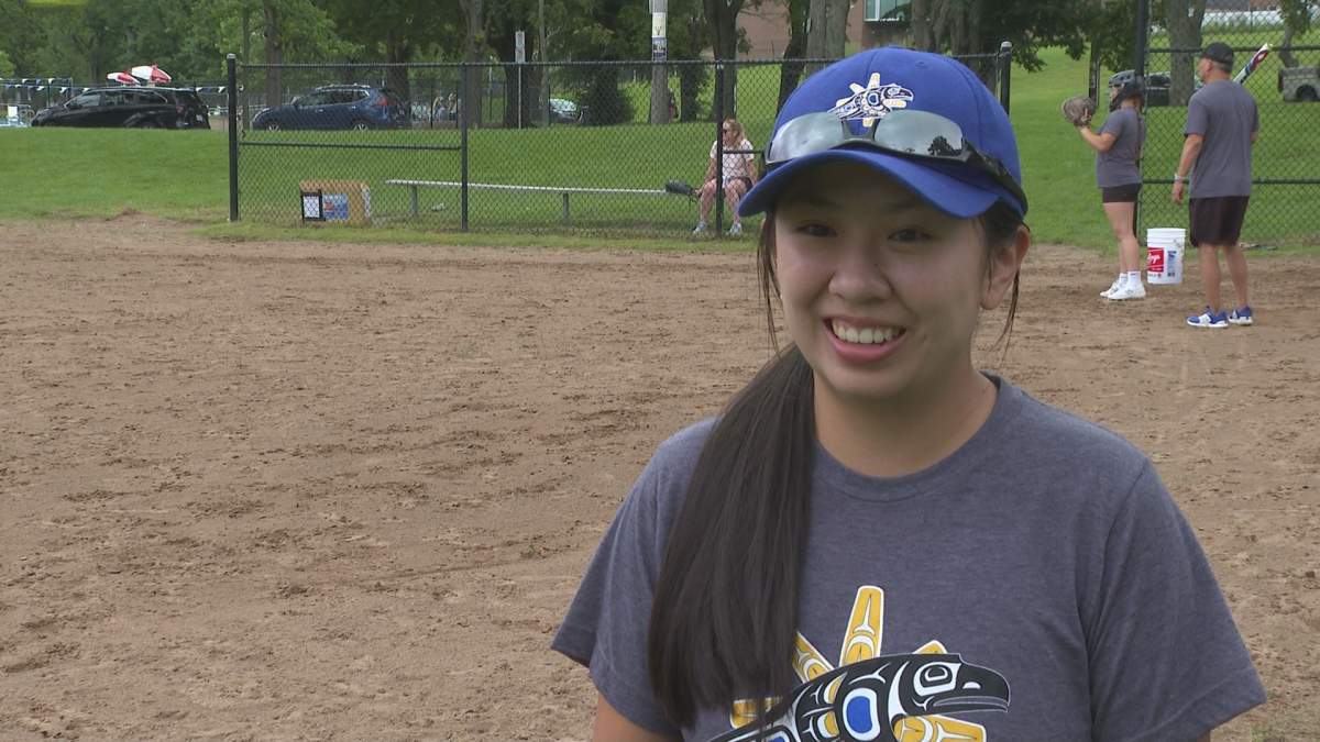 Hunter Lang speaks during a practice with her team on Sunday.