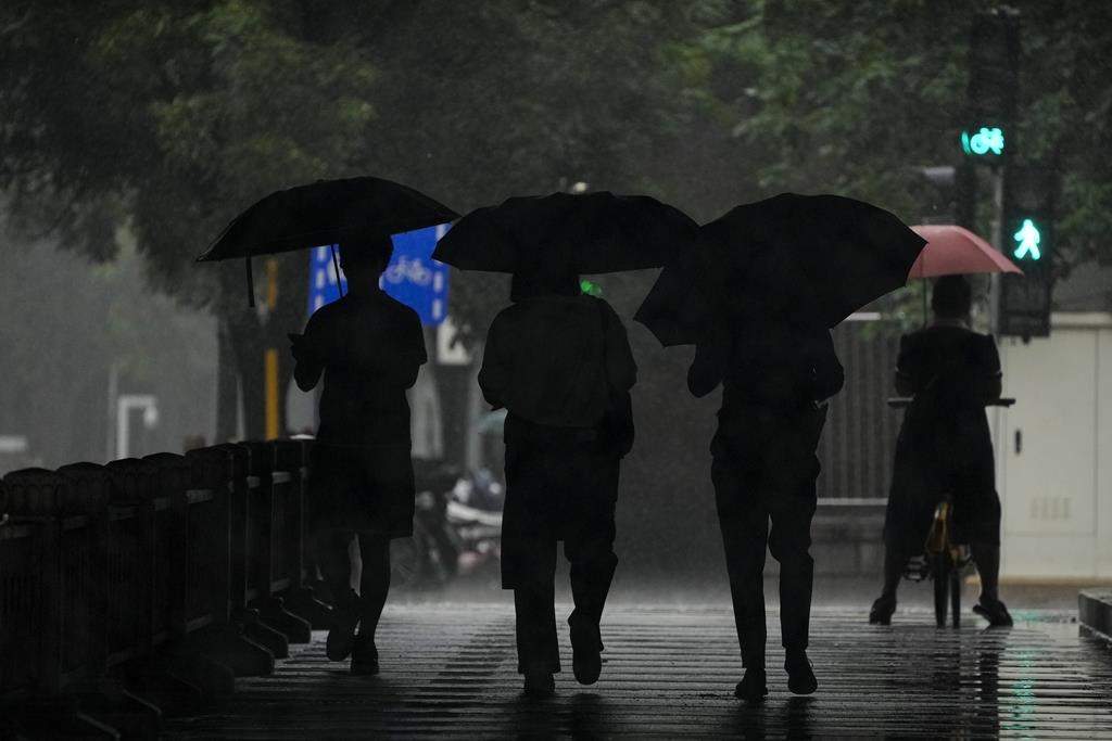 (AP Photo/Andy Wong).