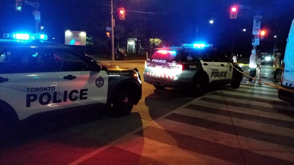 Police on scene following reports of a suspicious package in downtown Toronto on Aug. 2, 2023.