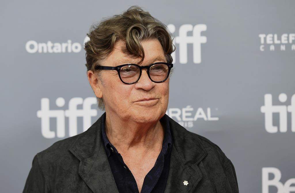 Robbie Robertson attends a press conference for "Once Were Brothers: Robbie Robertson and The Band" on day one of the Toronto International Film Festival on Thursday, Sept. 5, 2019, in Toronto. Robertson, the lead guitarist and songwriter for The Band, whose classics include “The Weight,” “Up on Cripple Creek” and “The Night They Drove Old Dixie Down,” died at 80, according to a statement from his manager.