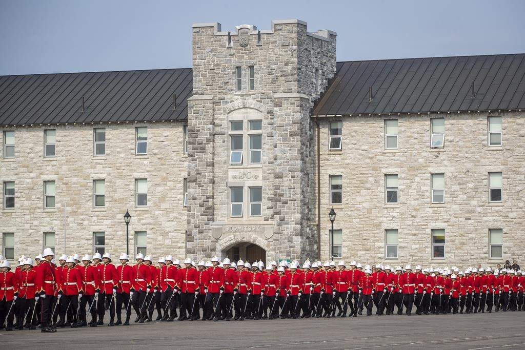Officer cadets march on the parade square before the Royal Military College Commissioning Parade in Kingston, Ont., on Friday May 19, 2023. The Ontario coroner will hold an inquest into the death of an officer cadet who took his own life while attending Royal Military College last year. 