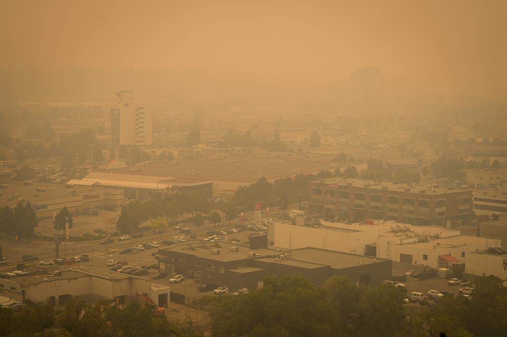 British Columbia’s desperate battle against hundreds of wildfires continues on multiple fronts today, but no new evacuation orders have been added overnight to the thousands already in place across the province. Smoke from wildfires fills the air in Kelowna, B.C., Saturday, Aug. 19, 2023.